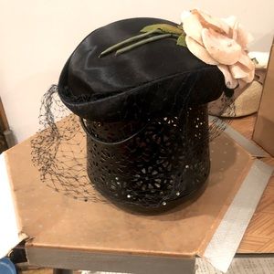 Vintage pillbox hat with veil.